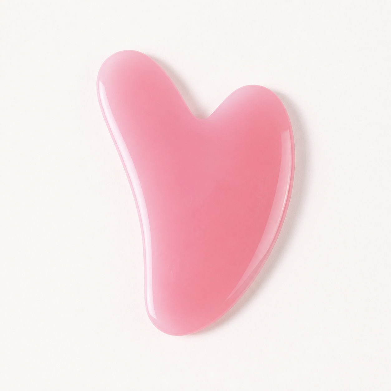 Pink Gua Sha facial massager