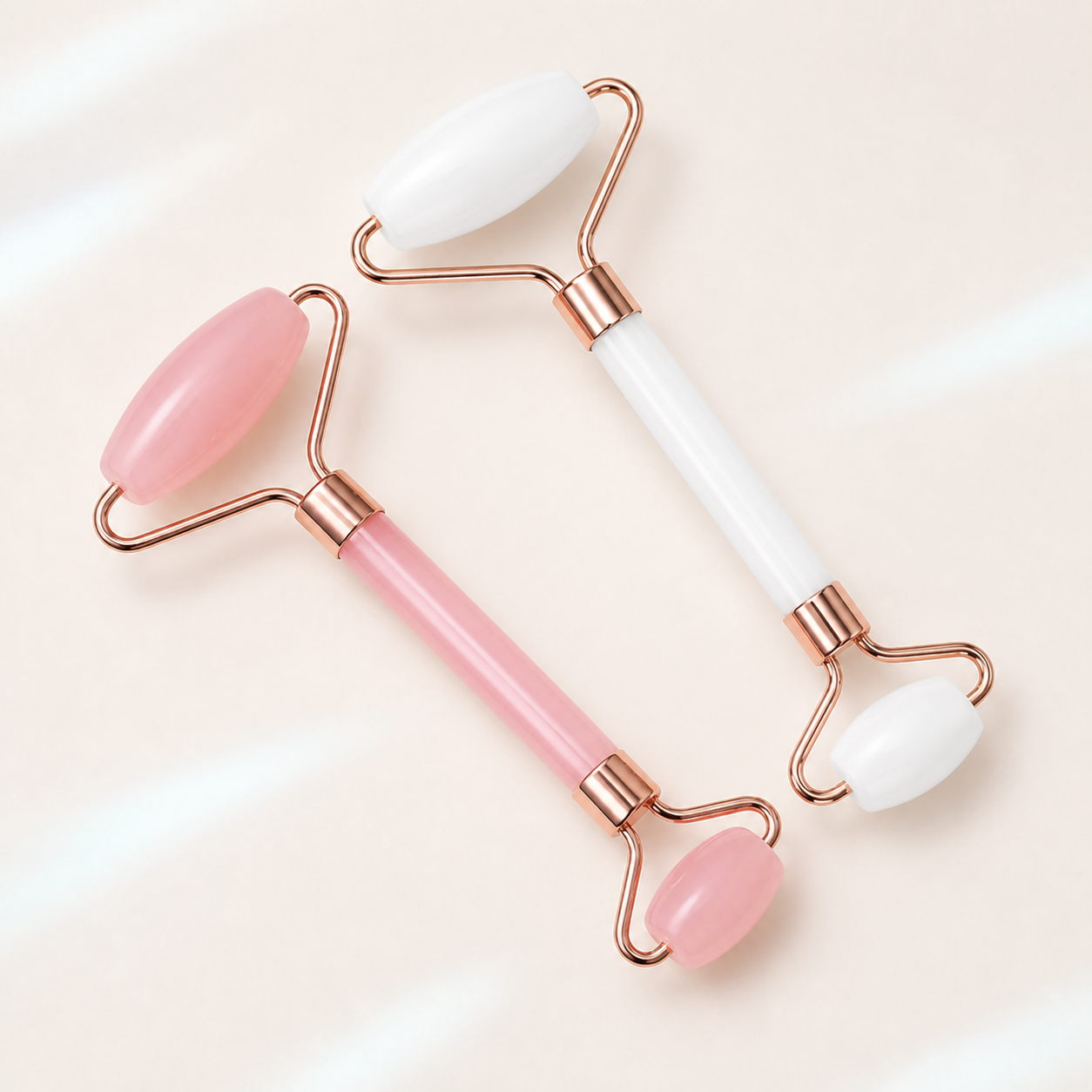 Pink and white facial roller variants